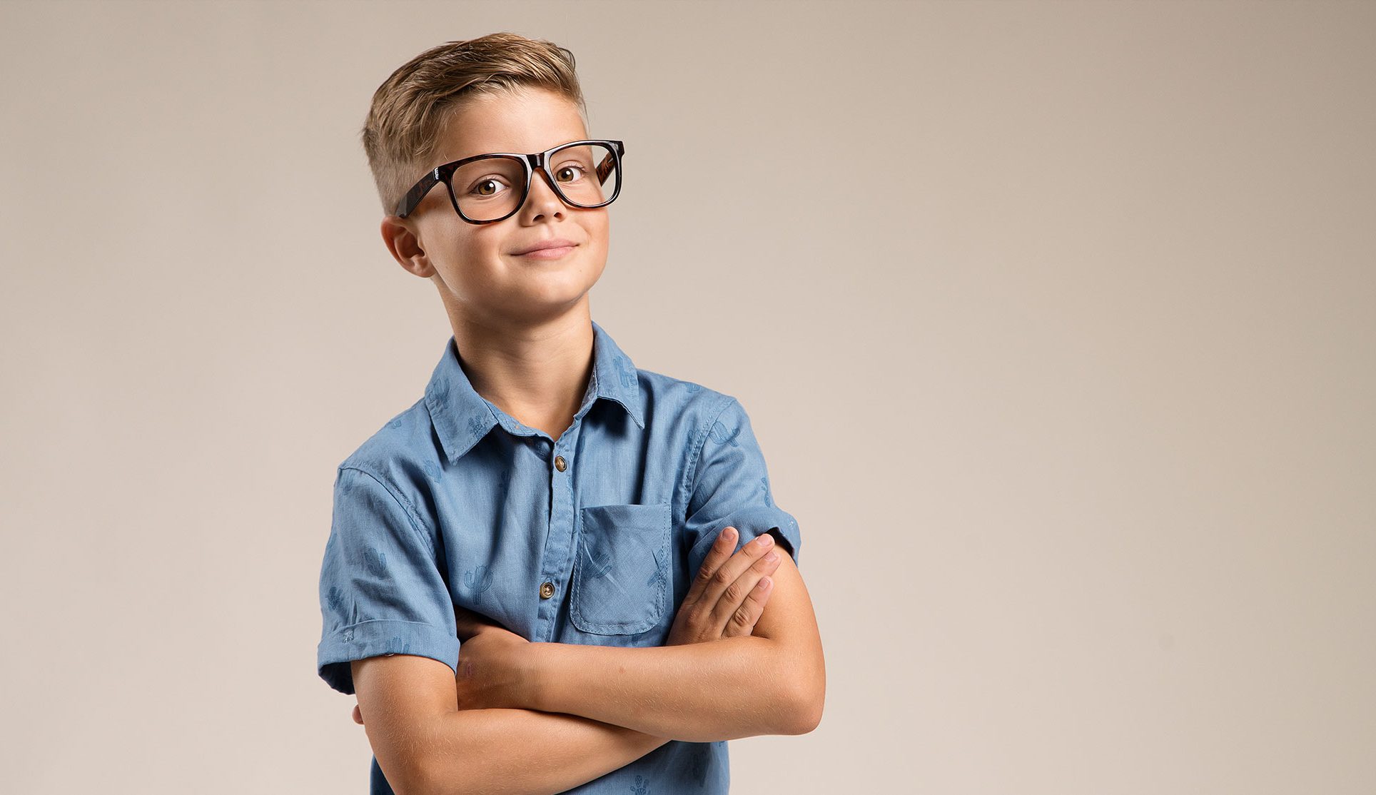 male child wearing glasses
